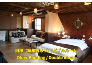 En eller flere senge i et værelse på Win Village