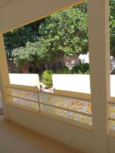 En balkon eller terrasse på Hôtel la Rèsidence de la mairie de Mèckhe