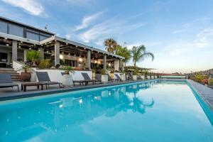 an image of a swimming pool at a resort at Exclusive SUPER-SIZE Holiday home - 12 bed,11 bath with Amazing Facilities, Sea and Mountain Views in Tías