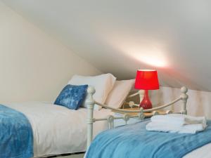 En eller flere senge i et værelse på Church View - Ukc2302