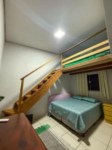 En eller flere senge i et værelse på Casa ampla com vista pra mata