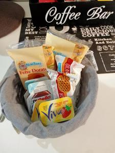 a bowl filled with different types of food at Il Rifugio Dei Bizantini in Ravenna