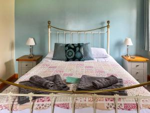 En eller flere senge i et værelse på The Larches