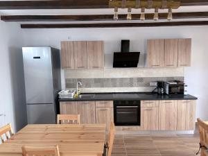 Nhà bếp/bếp nhỏ tại Casa Magda - Oaza de Relaxare +10 ảnh