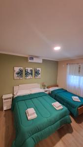 Postel nebo postele na pokoji v ubytování Flor de Lis Casas de Campo