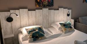 Postel nebo postele na pokoji v ubytování Ti Roc Studio