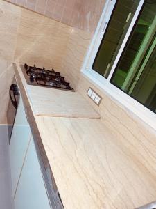 Køkken eller tekøkken på L oasis cachée à deux pas de plage et piscine