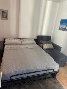 a bedroom with two beds in a room at HENRY BENNEt in Menton