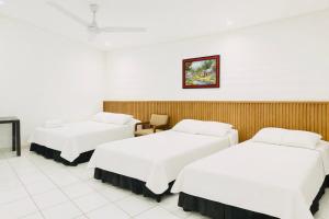 Postel nebo postele na pokoji v ubytování Hotel Raíces Ataco