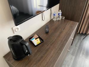 TV/trung tâm giải trí tại Hôtel Restaurant l'Annexe +20 ảnh