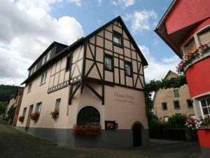 a building in the middle of a street at Apartment FEWO Veilchen by Interhome in Ernst