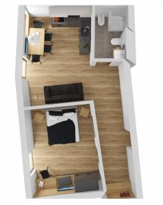 una planimetria di una stanza con un letto di Active Hotel Sonne a Gais