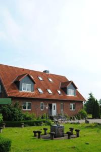 a house with a lot of windows on it at Apartment Schule 5 by Interhome in Windeby