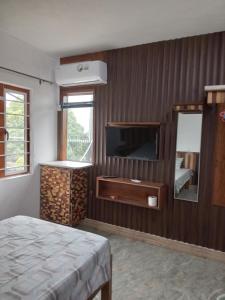 TV a/nebo společenská místnost v ubytování Affa Tourist Residence