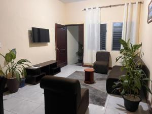 TV a/nebo společenská místnost v ubytování Casa Vásquez