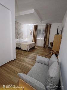 En eller flere senge i et værelse på Rooms 2,6