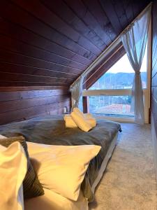 Postel nebo postele na pokoji v ubytování Cosy Dream Appartment near Borovets