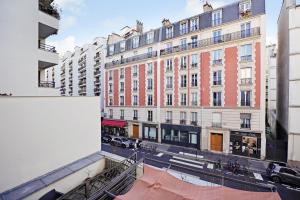 uitzicht op een straat met gebouwen bij Studio cosy - 2P - Bercy in Parijs