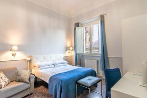 En eller flere senge i et værelse på Duomo View