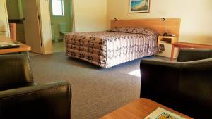 Posezení v ubytování Tudor Lodge Motel