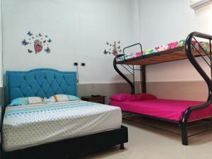 Llit o llits en una habitació de VaRI