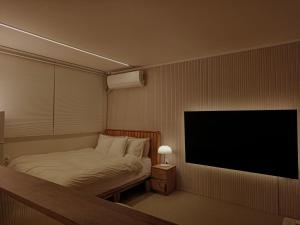 Et tv og/eller underholdning på Ansan Minimal Studio