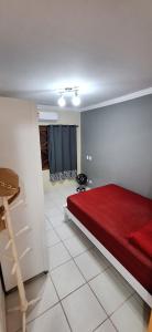 En eller flere senge i et værelse på Casa na praia de maresias em condomínio com piscina aquecida na av principal de maresias