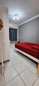 En eller flere senge i et værelse på Casa na praia de maresias em condomínio com piscina aquecida na av principal de maresias