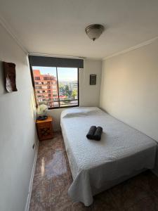 En eller flere senge i et værelse på Dept Hermosa Vista, Las Condes + 14 billeder