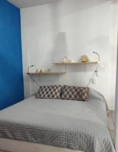 En eller flere senge i et værelse på Casa Tamarindo + 20 billeder