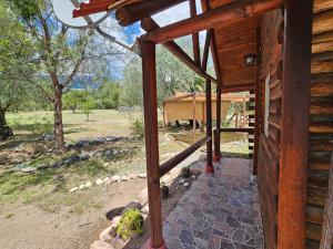 an outside view of a house with a porch at Cabañas Lumel in Carpintería