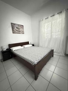 Llit o llits en una habitació de Olympus Embrace 8 fotos més