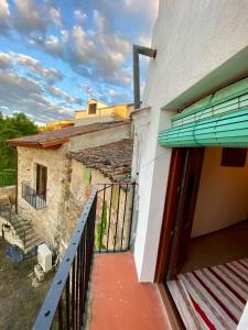 an outside view of a building with a balcony at Casa Pueblo Anibal in Fermoselle
