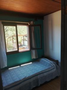 Giường trong phòng chung tại Metamorfosis Aguada +17 ảnh