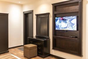 Et tv og/eller underholdning på شقق اماليا للشقق المخدومة