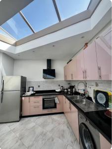 a kitchen with a large skylight in the ceiling at The Sun Gate in Agadir