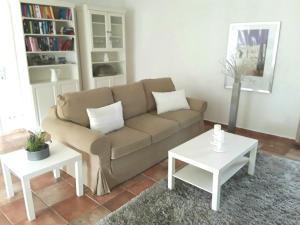 a living room with a couch and two tables at Apartment Marie-Luise by Interhome in Ferchesar