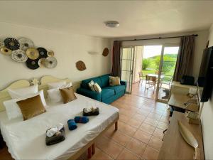 Posezení v ubytování Village Vacances Sainte Anne - Explorer by Barbadine Vacances - Hébergement garanti