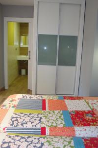 Postel nebo postele na pokoji v ubytování Hostal El Recanto