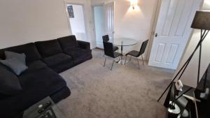 Et opholdsområde på The Windmill + 3 billeder