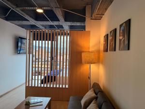 TV/trung tâm giải trí tại Artistico Loft Central con Balcón