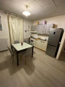 Køkken eller tekøkken på Affittacamere La Quiete