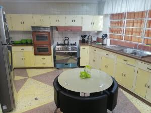 Køkken eller tekøkken på Casa ENLACE