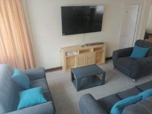 Et tv og/eller underholdning på Casa ENLACE + 9 billeder