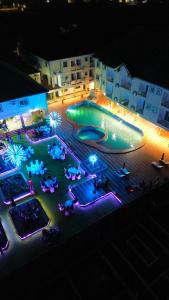 an overhead view of a swimming pool at night at Dellagio Hotel in Wa