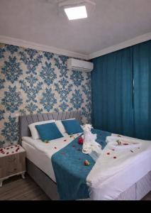 Giường trong phòng chung tại Paradise House