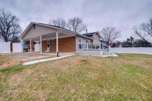 a house with a large yard in front of it at Great for Gatherings! Modern Lanham Duplex in Lanham