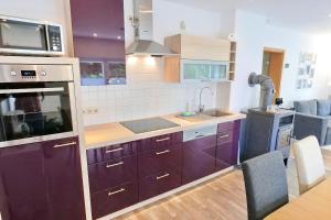 Kuchyň nebo kuchyňský kout v ubytování Kleiner Seezauber Bad Kleinen - ABC555