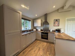 Køkken eller tekøkken på Duet Lodge