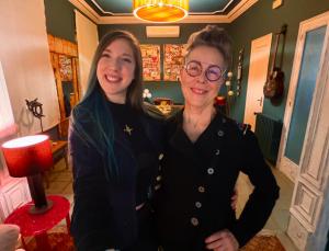 two women standing next to each other in a room at Carmen Guillemot in Alcanar